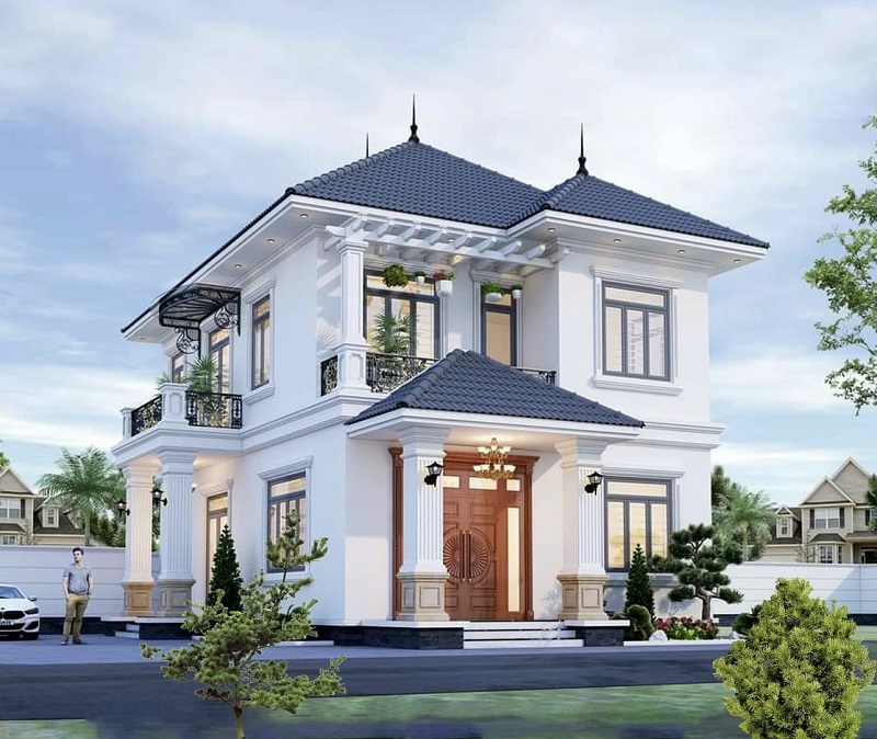 Mẫu thiết kế nhà 2 tầng sử dụng hệ mái Nhật hài hòa với cảnh quan