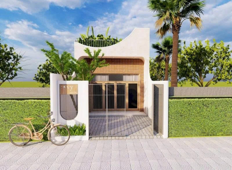 Nhà cấp 4 dạng ống với thiết kế xen kẽ các mảng xanh tạo cảm giác gần gũi